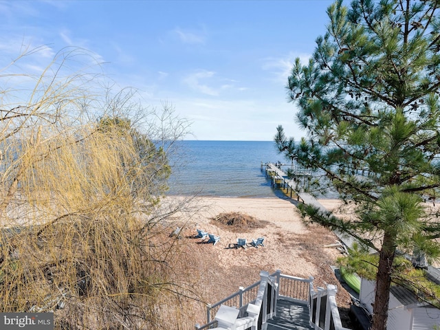 property view of water featuring a beach view