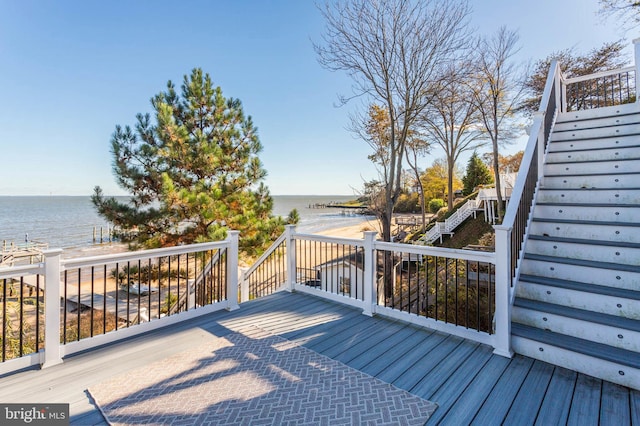 deck featuring a water view