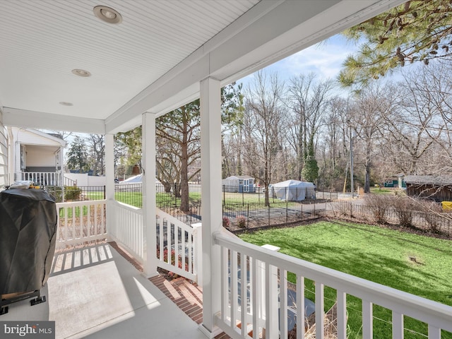 exterior space featuring area for grilling and covered porch