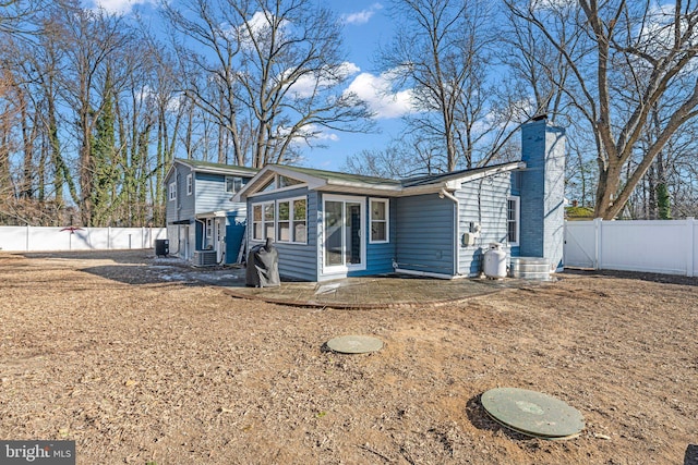 view of front of property featuring cooling unit