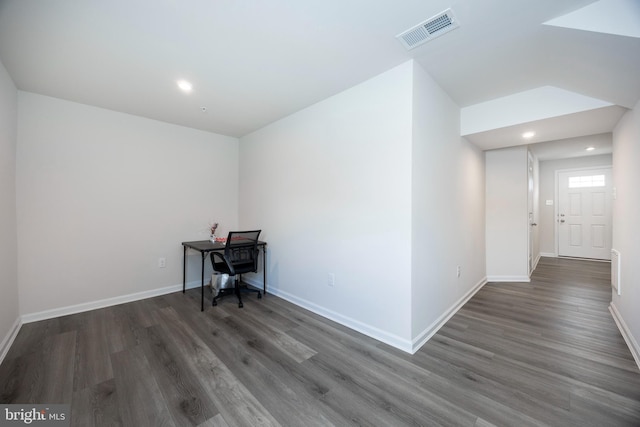 office space with dark wood-type flooring