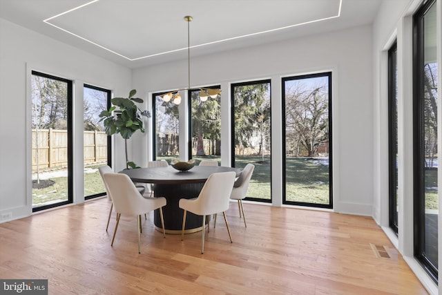 dining room featuring light wood-type flooring