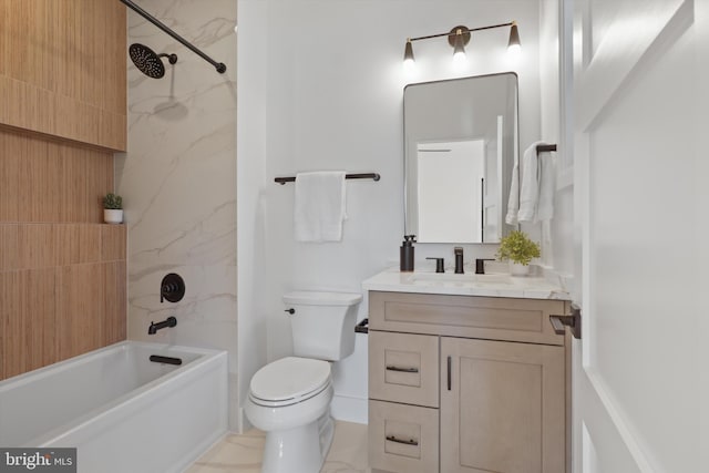 full bathroom with vanity, toilet, and tiled shower / bath