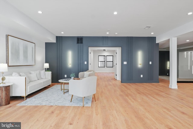 living room with light hardwood / wood-style floors