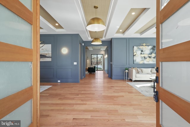 corridor with light wood-type flooring