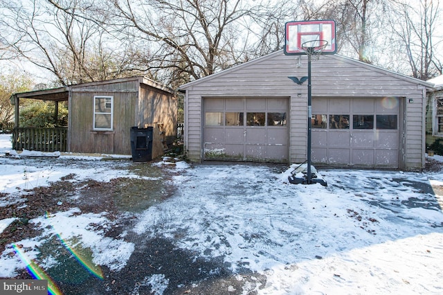 view of snow covered garage