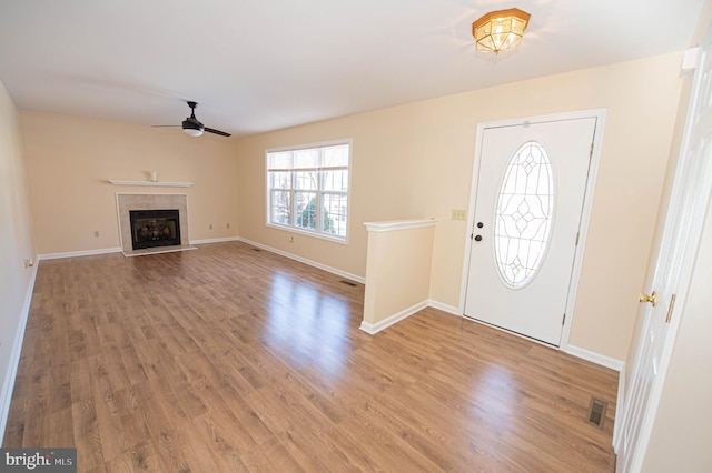 foyer featuring ceiling fan and hardwood / wood-style floors