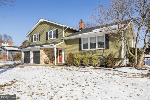 view of front of house with a garage