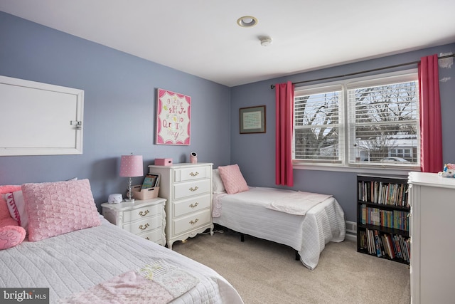 bedroom with light carpet