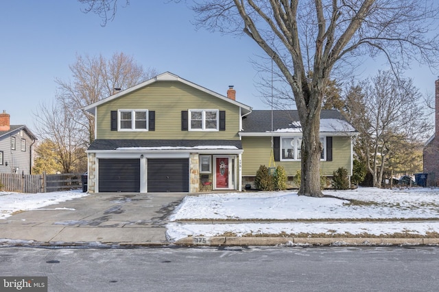 view of front of house with a garage