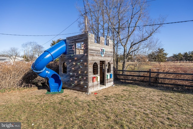 view of playground with a yard