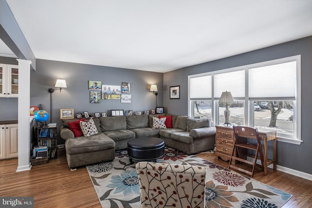 living room with dark hardwood / wood-style flooring