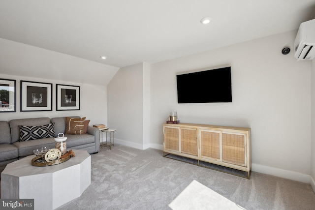 living room with light colored carpet, a wall mounted AC, and vaulted ceiling