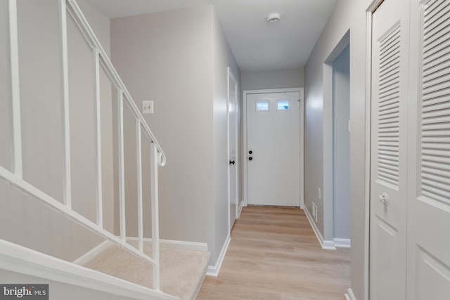 corridor featuring light hardwood / wood-style flooring