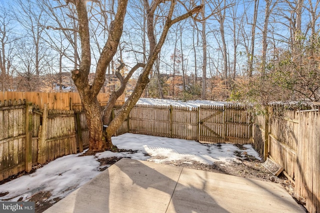 view of snow covered patio