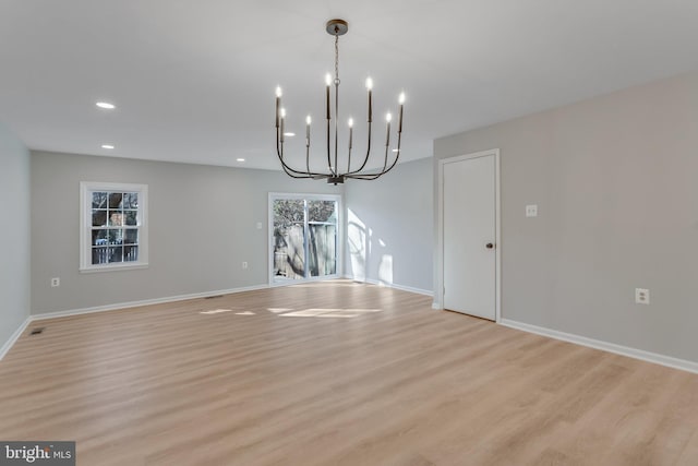 unfurnished dining area featuring light hardwood / wood-style flooring