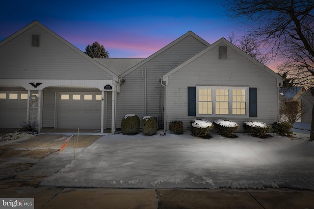 ranch-style home with a garage