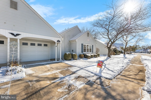 exterior space with a garage