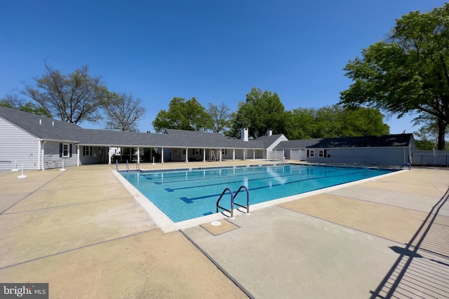 view of pool featuring a patio