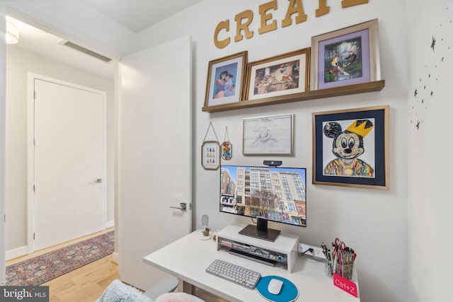 home office featuring wood-type flooring