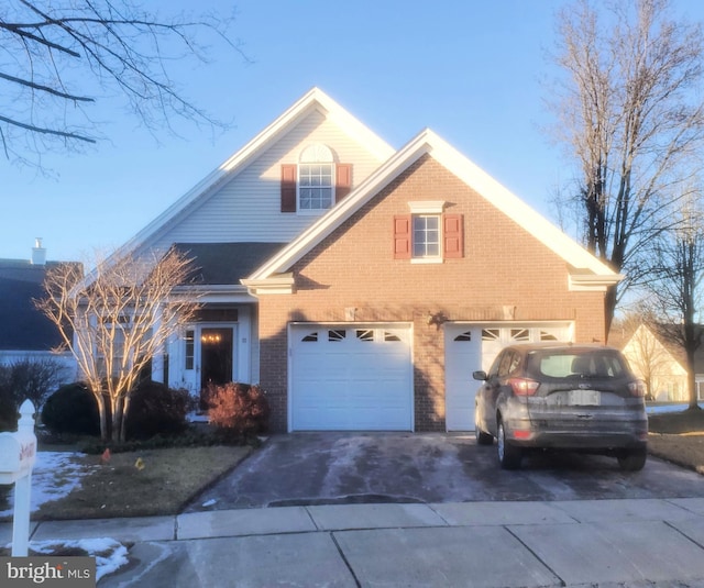 front facade with a garage