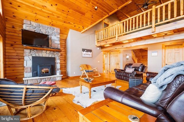 living room with wood-type flooring, high vaulted ceiling, and wooden ceiling