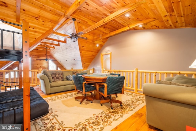 living room featuring wood ceiling, ceiling fan, lofted ceiling with beams, and light hardwood / wood-style flooring