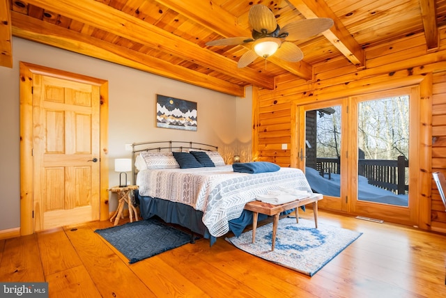 bedroom with wood walls, light wood-type flooring, access to outside, wooden ceiling, and beam ceiling