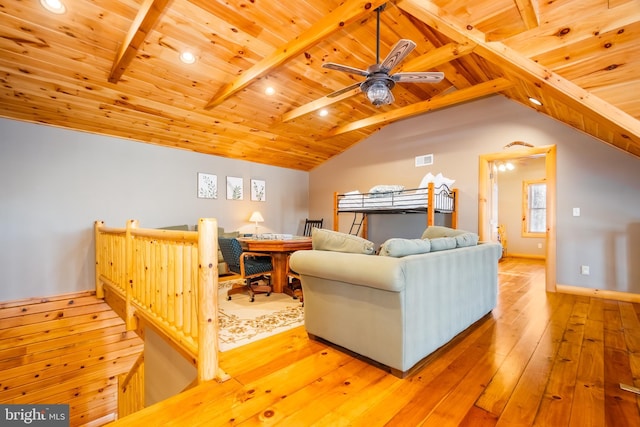 living room featuring wood ceiling, light hardwood / wood-style flooring, and lofted ceiling with beams