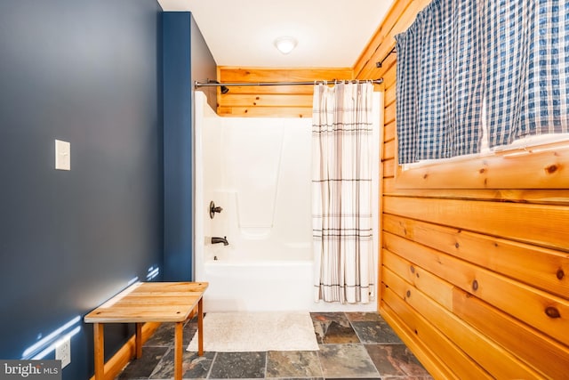 bathroom featuring shower / bath combo with shower curtain