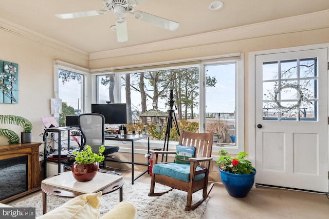 sunroom / solarium with ceiling fan