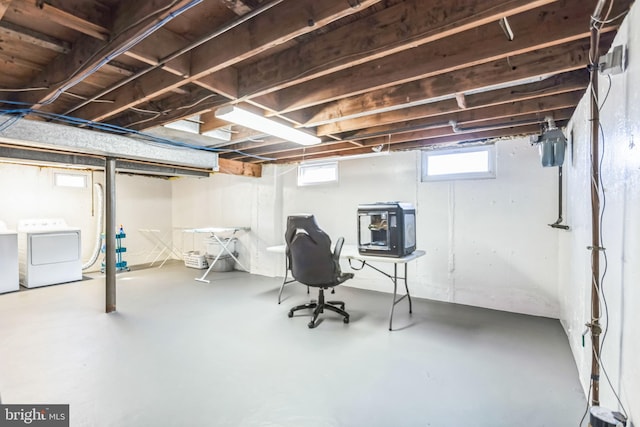 basement featuring separate washer and dryer