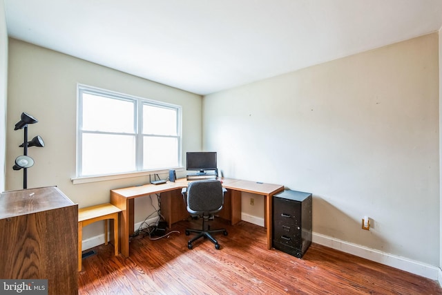 office space featuring hardwood / wood-style floors