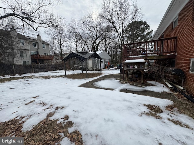 view of yard covered in snow