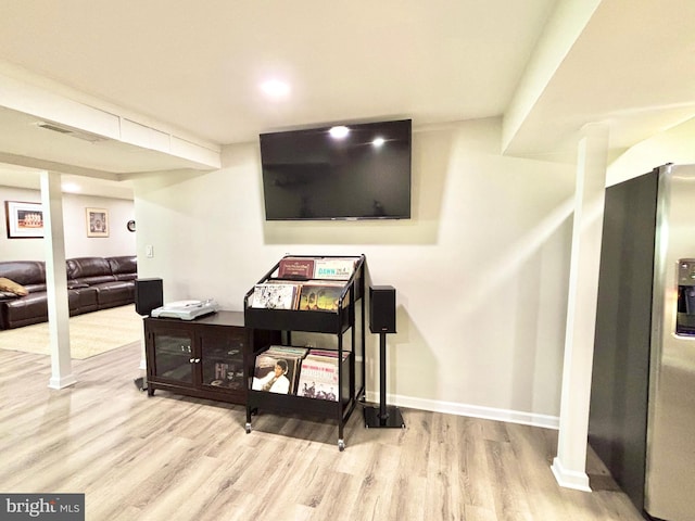 living room with light hardwood / wood-style floors