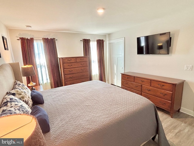 bedroom featuring light wood-type flooring