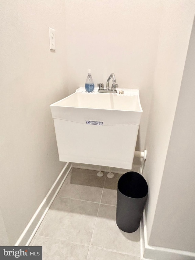 bathroom with tile patterned floors and sink