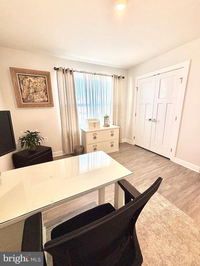 home office with light wood-type flooring