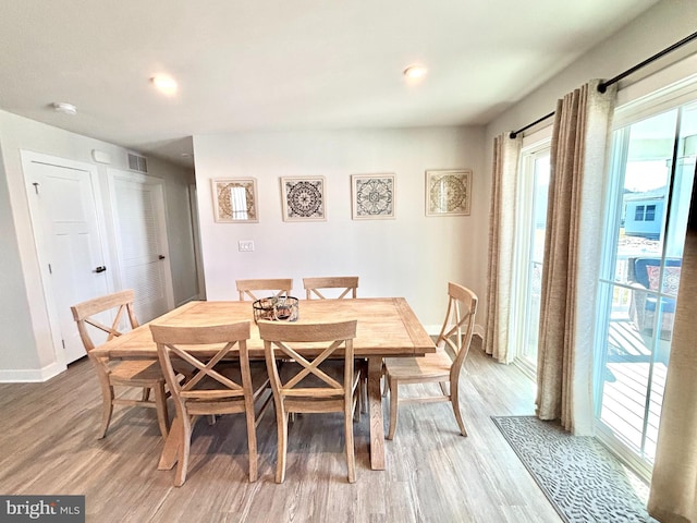 dining room featuring hardwood / wood-style flooring