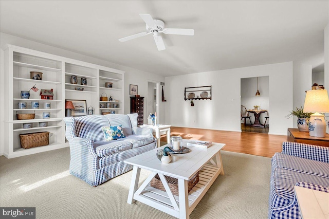 living room featuring ceiling fan