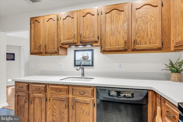 kitchen with black dishwasher and sink