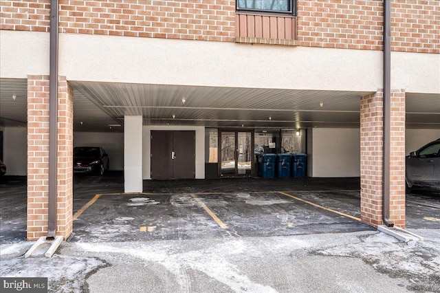 garage featuring a carport