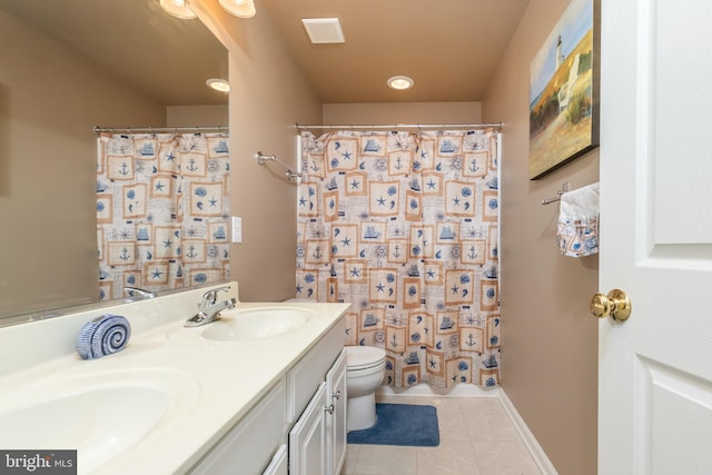 bathroom with a shower with curtain, vanity, tile patterned floors, and toilet