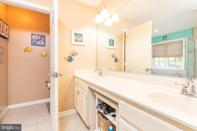 bathroom with vanity and tile patterned floors