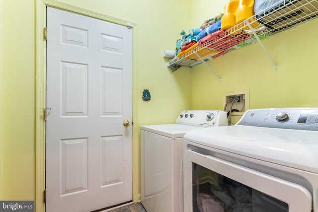 washroom with washer and dryer