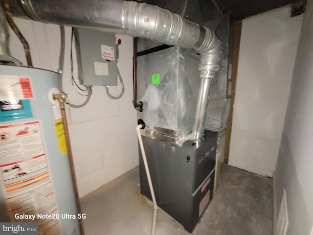 utility room with gas water heater