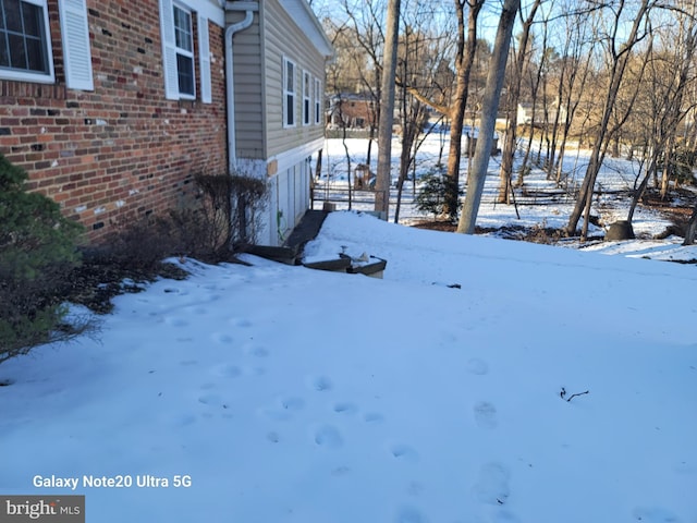 view of snowy yard