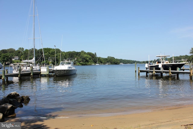 view of dock with a water view