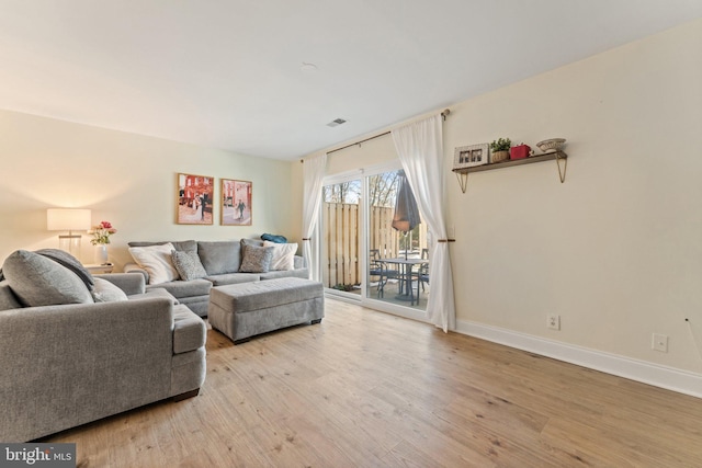 living room featuring light wood-type flooring