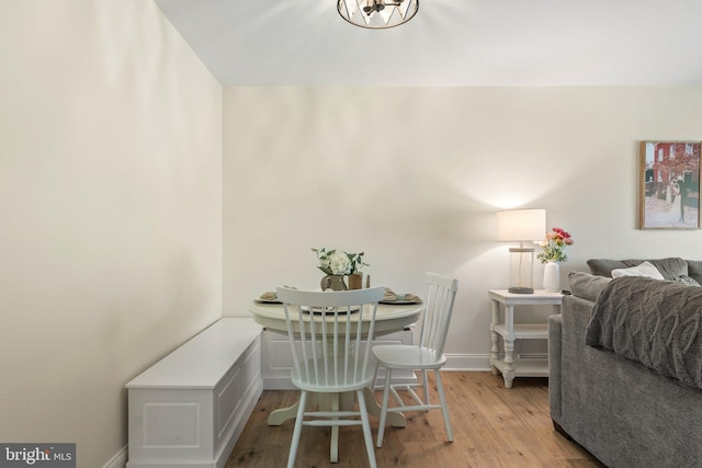 dining space with light wood-type flooring